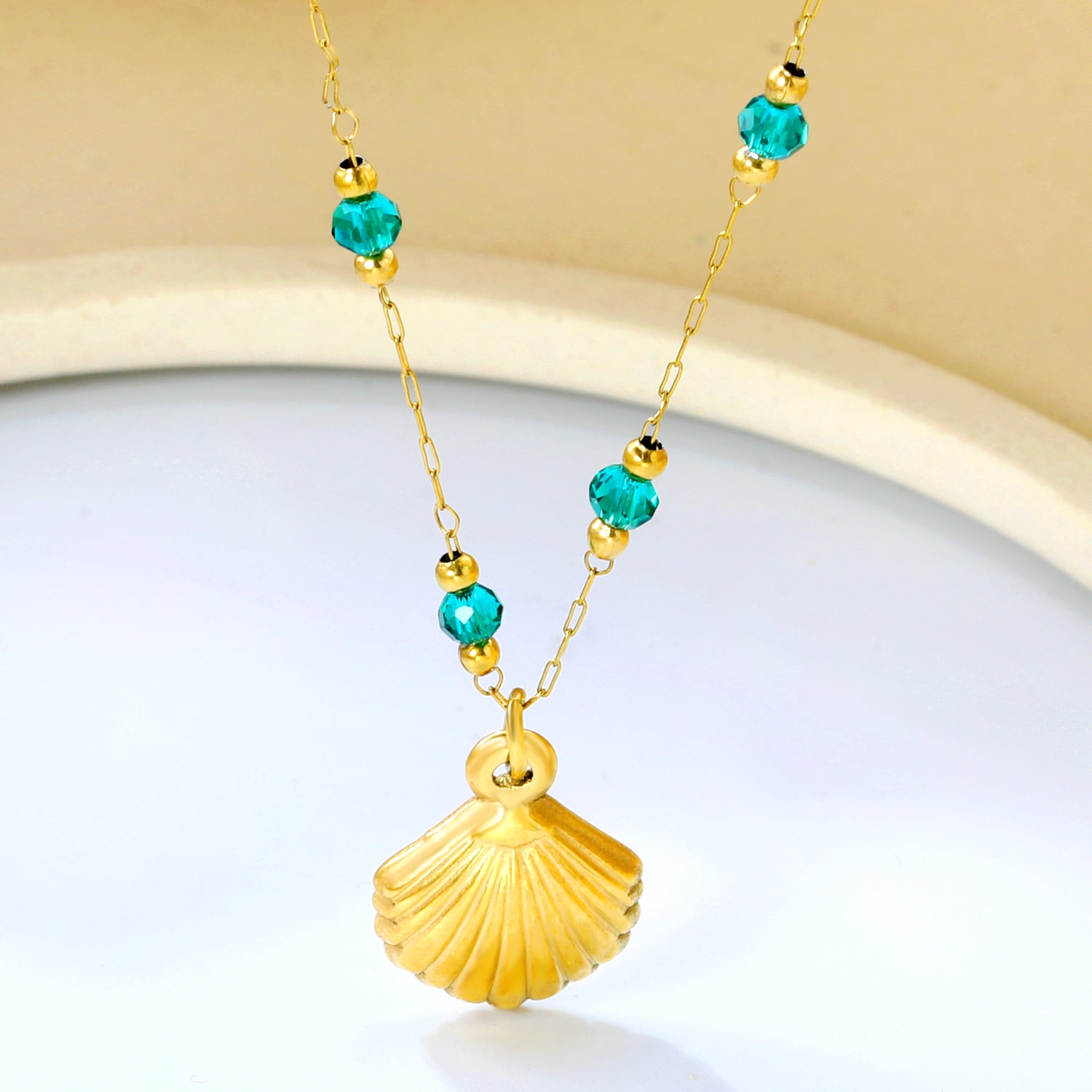 Gold Seashell Pendant Necklace with Green Beads
