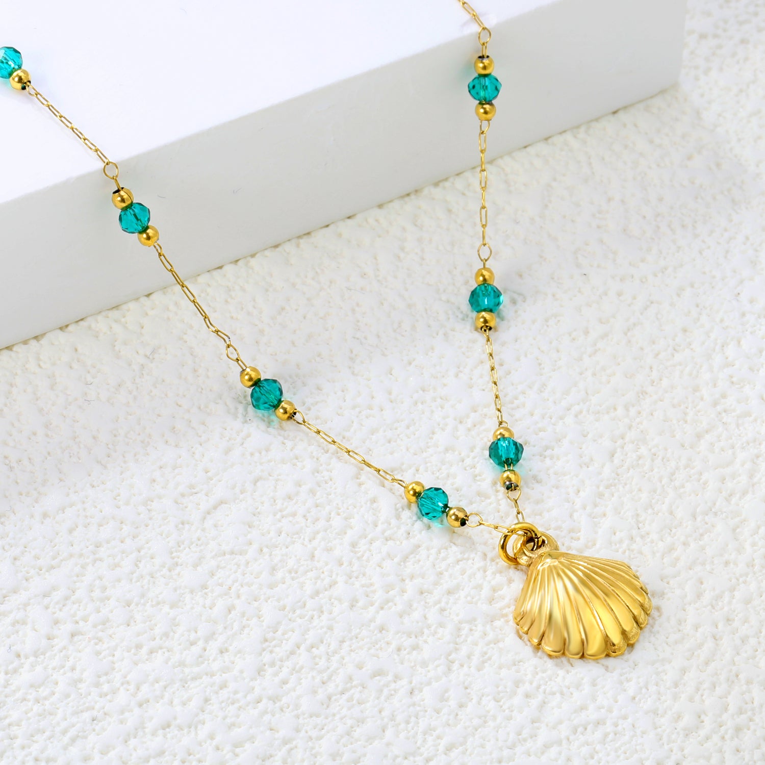 Gold Seashell Pendant Necklace with Green Beads