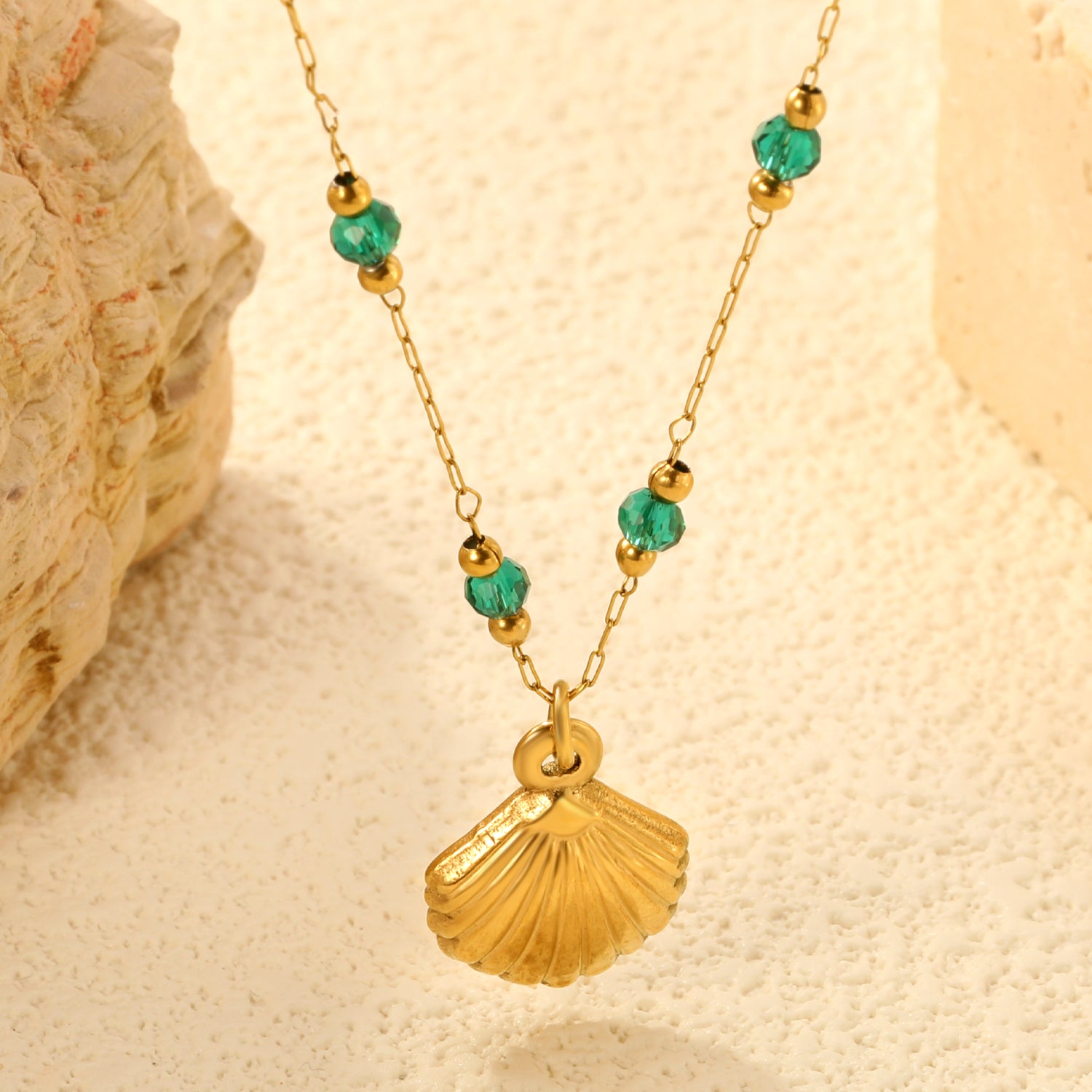 Gold Seashell Pendant Necklace with Green Beads