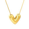 18k gold platedheart-shaped necklace on a white background