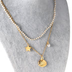 Layered Pearl Necklace with Seashell & Star Charms