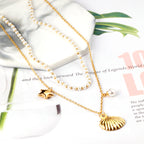 Layered Pearl Necklace with Seashell & Star Charms