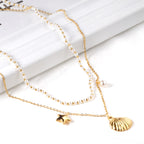 Layered Pearl Necklace with Seashell & Star Charms