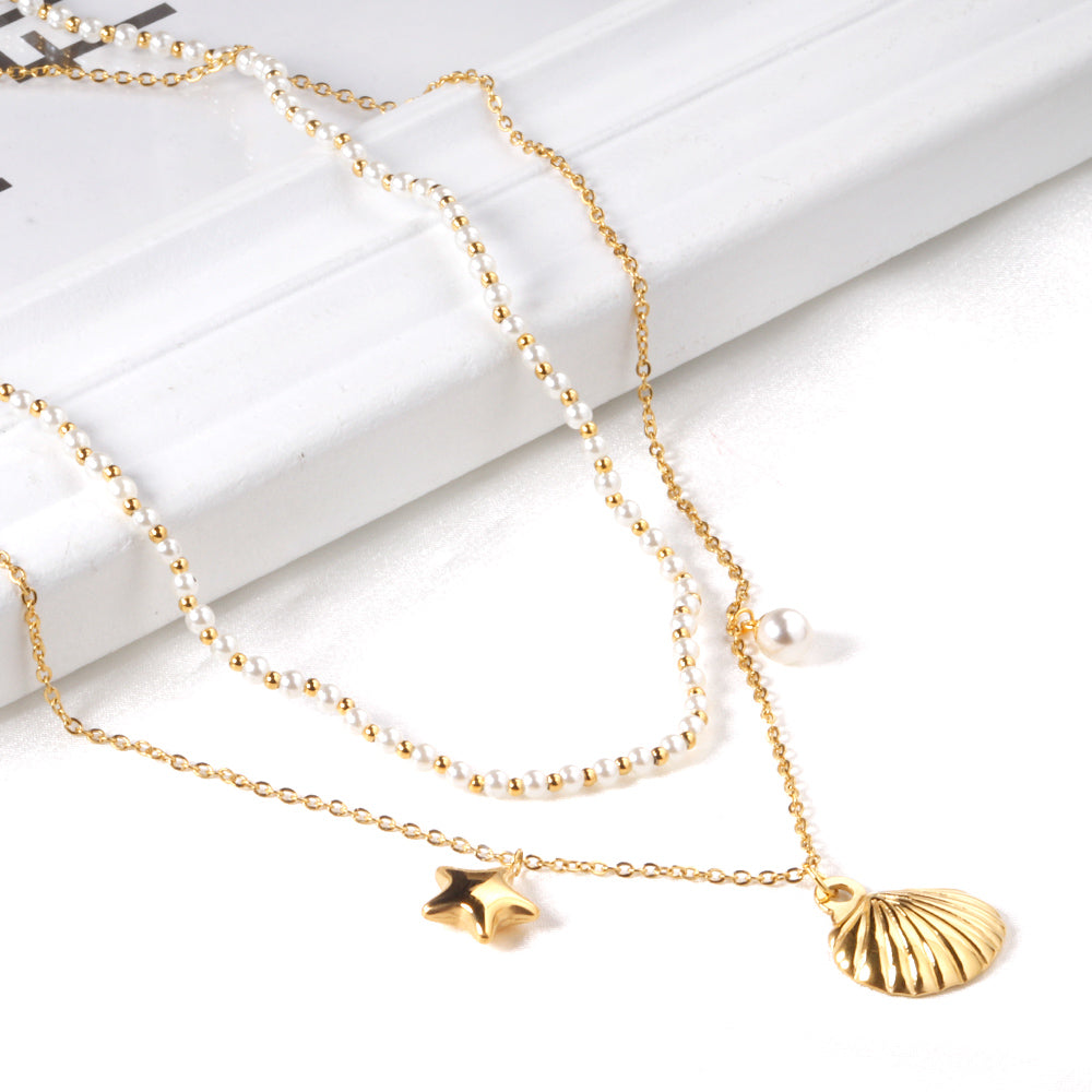 Layered Pearl Necklace with Seashell & Star Charms