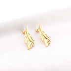Gold Feather Statement Stud Earrings