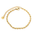 18k gold plated bracelet with beaded design on a white background | elazo