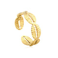 Gold hoop earring on a white background