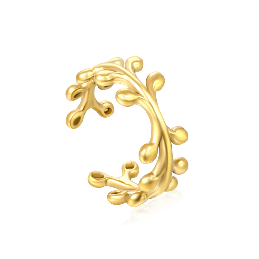 Gold leaf-shaped earring on a white background