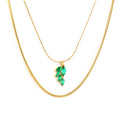 18k gold plated necklace with a green leaf-shaped pendant on a white background 18K Gold Plated on premium Stainless Steel, this necklace  is 100% waterproof, sweat-proof, and anti-tarnish. Designed for active women. Skin-friendly for the Chennai gym heat. Buy 2 Get 1 FREE!