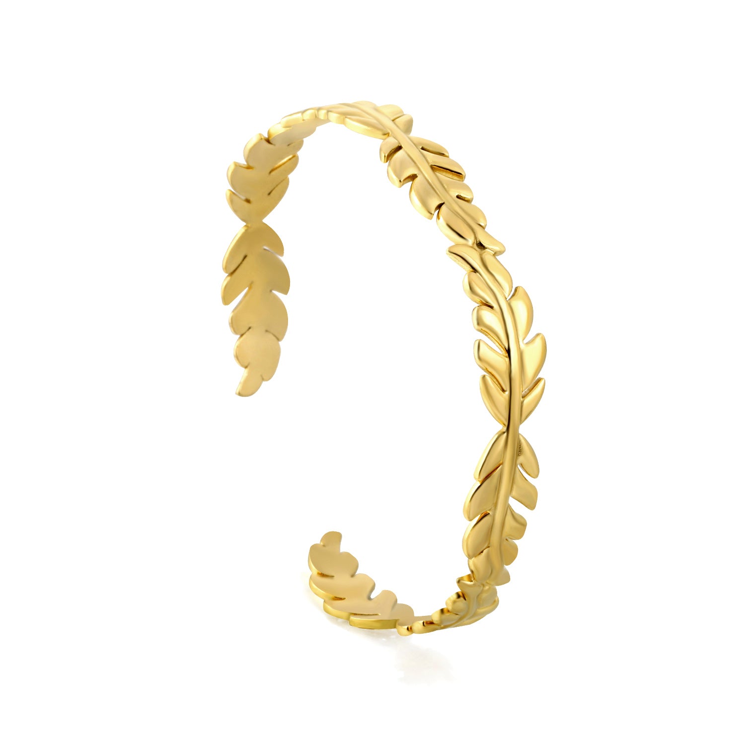 Gold leaf-patterned ring on a white background