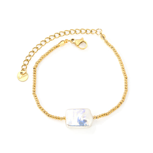 18k gold plated bracelet with a large white pearl on a white background | elazo