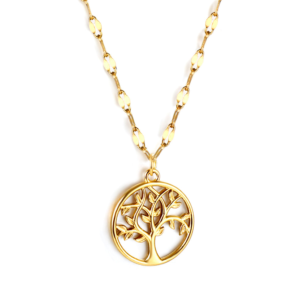 Gold tree of life necklace on a white background