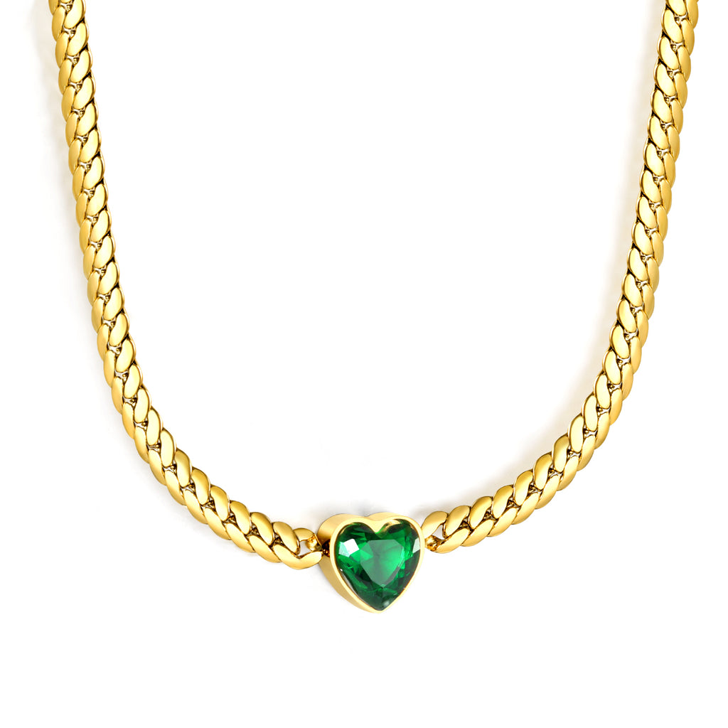 18k gold plated chain necklace with a heart-shaped green gemstone on a white background  18K Gold Plated on premium Stainless Steel, this necklace  is 100% waterproof, sweat-proof, and anti-tarnish. Designed for active women. Skin-friendly for the Chennai gym heat. Buy 2 Get 1 FREE!