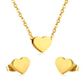 Gold heart-shaped necklace and earrings on a white background